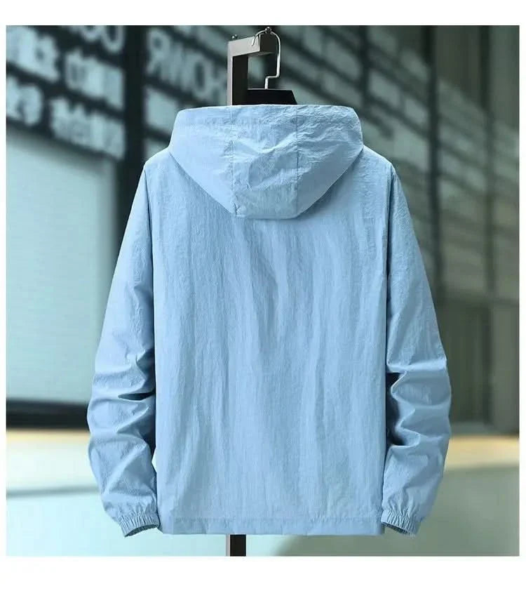 Hooded summer jacket in light blue, back view with drawstring hood and ribbed cuffs