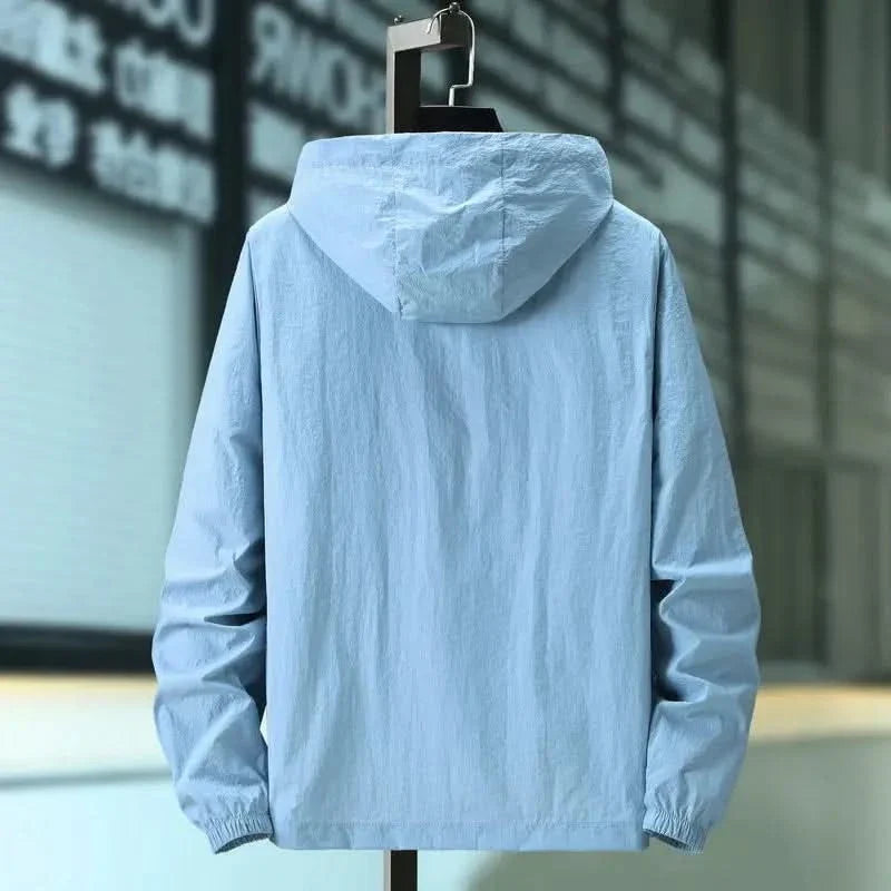 Light blue hooded summer jacket with zip front and elastic cuffs, back view