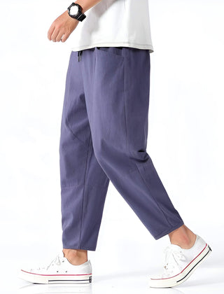 Indigo cropped cotton pants with drawstring waist and tapered legs