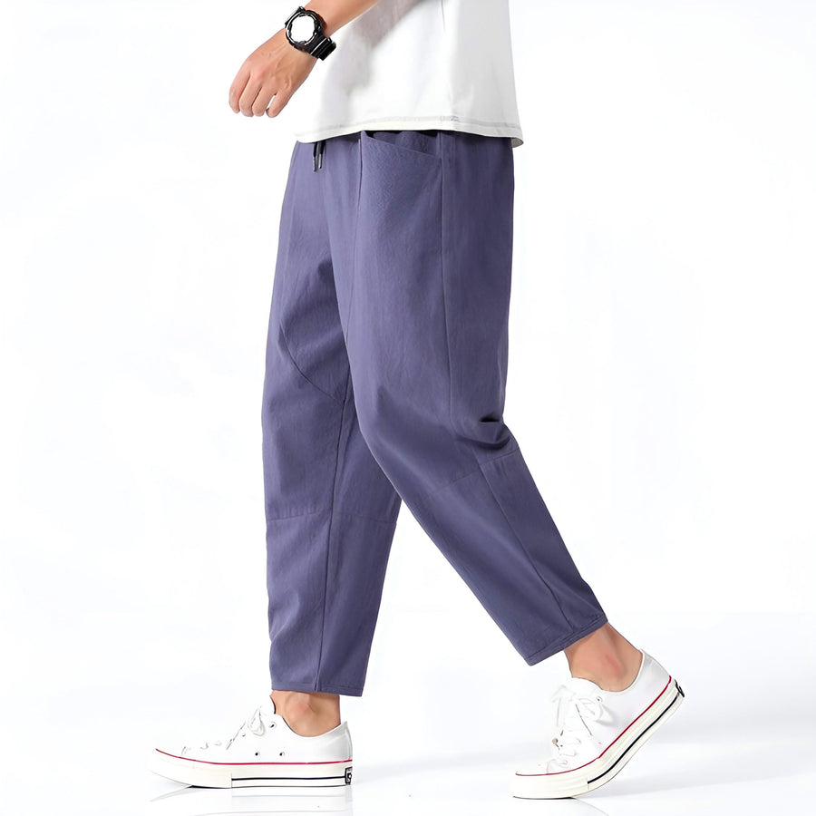 Indigo cropped cotton pants with drawstring waist and tapered legs