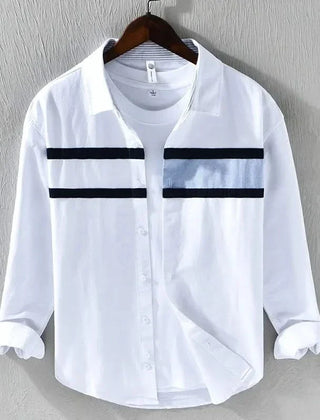 White panel button-up shirt with dark stripe band across chest, long sleeves, button front