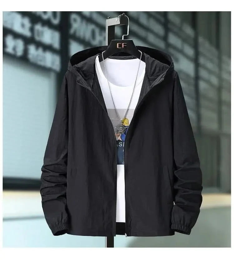Black hooded summer jacket with zip front and elastic cuffs, worn over a white tee