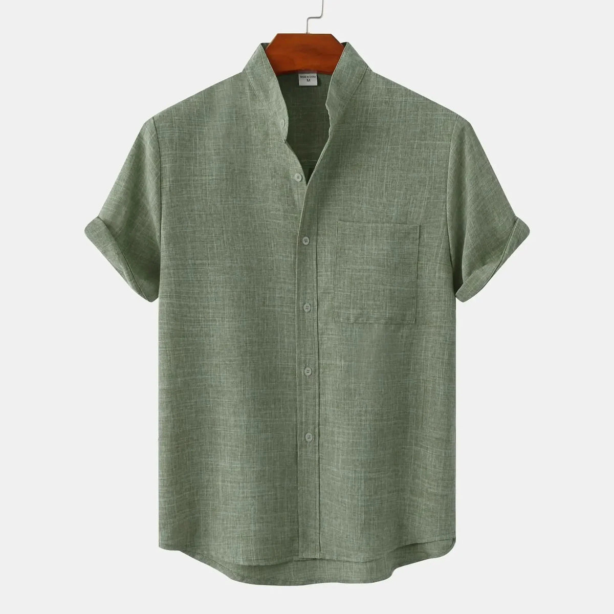 Short-sleeve button-up shirt in olive green with button front and chest pocket