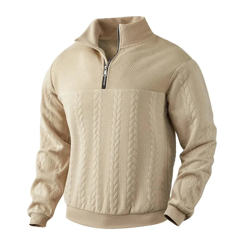 Beige quarter-zip sweatshirt with stand collar, black zipper, and textured knit front