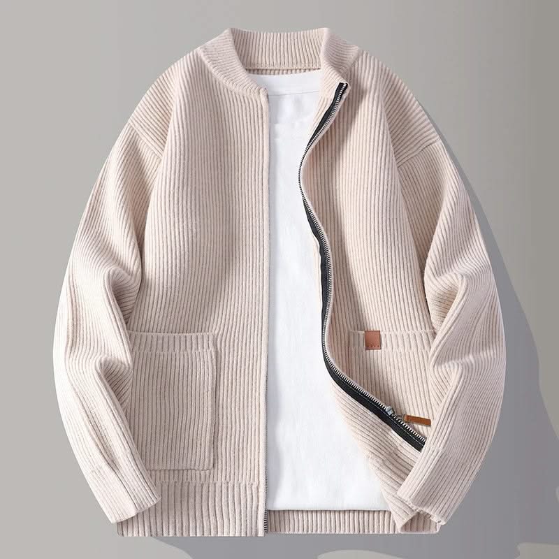 Beige rib knit zip-up jacket with stand collar, front pockets, and tan logo patch