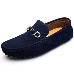 Navy suede loafers with silver buckle ornament and textured rubber outsole
