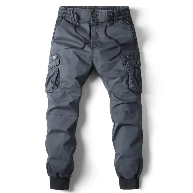 Dark grey cargo pants with drawstring waist, button fly, and side cargo pockets