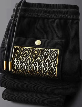 Black ribbed cotton pants, elastic waistband, drawstring, patterned front pocket