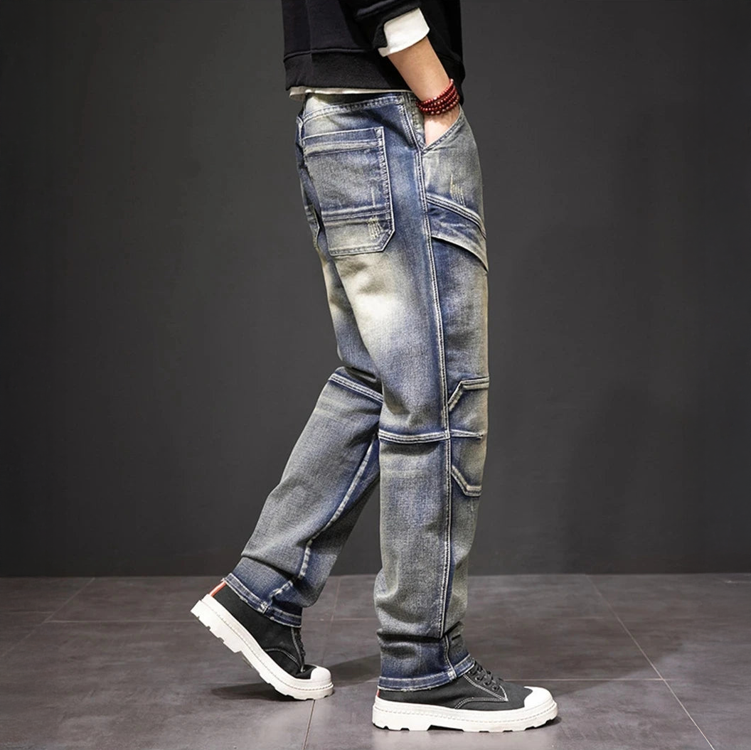 Men's straight jeans, light blue wash with angled seams, oversized thigh flap pockets