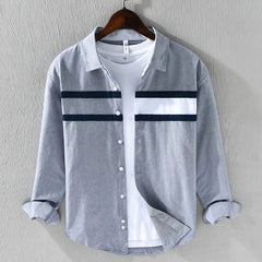 Grey panel button-up shirt with white chest yoke and dark stripe bands, long sleeves