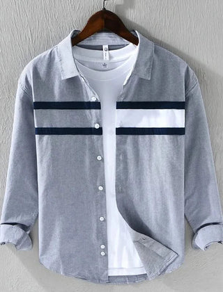 Grey panel button-up shirt with white chest yoke and dark stripe bands, long sleeves