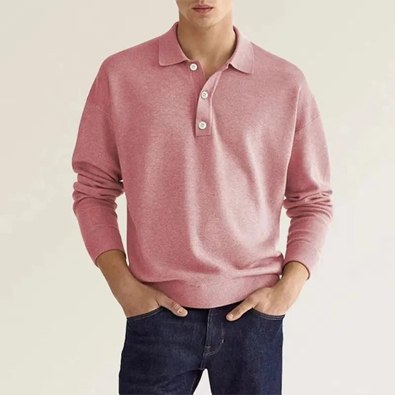 Pink wool polo shirt on model with long sleeves and three-button placket