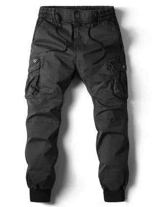 Black cargo pants with drawstring waist, button fly, and side cargo pockets