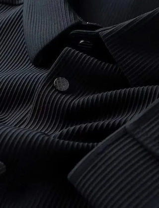 Dark navy business shirt close-up, ribbed fabric with round dark buttons