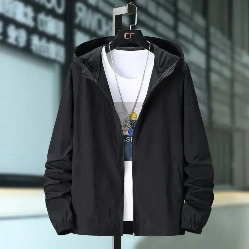 Black hooded summer jacket with zip front and elastic cuffs, worn over a white tee