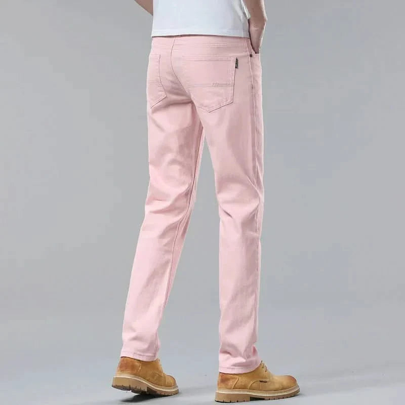 Pink denim jeans on-model, straight-leg fit with belt loops and rear pocket