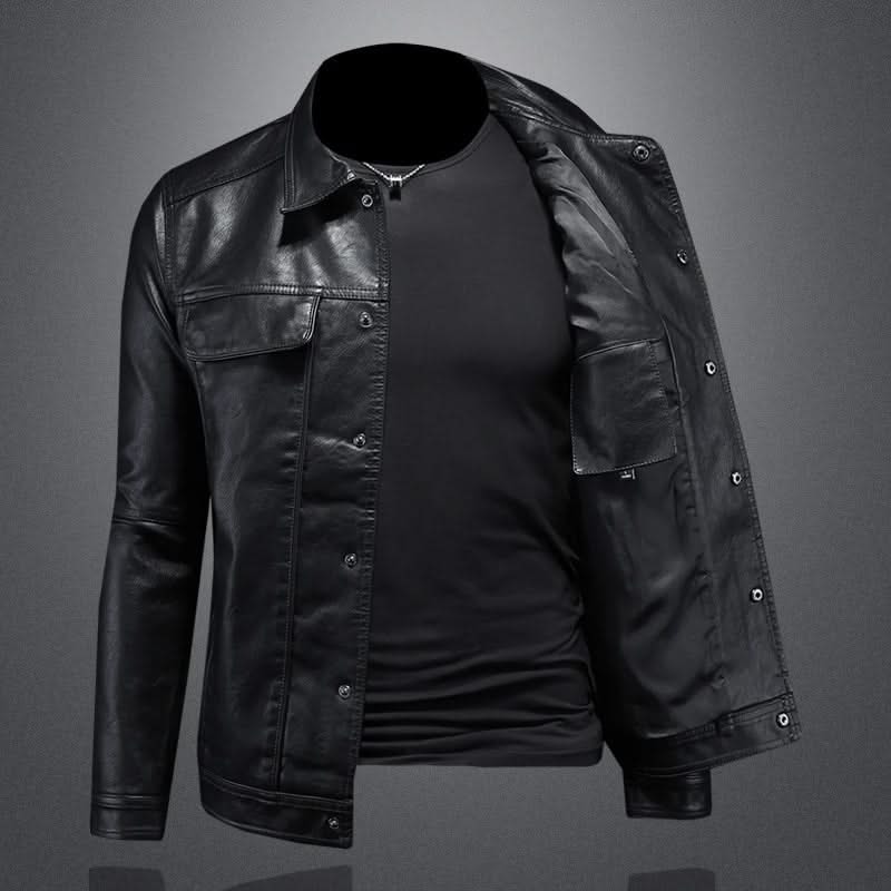 Black leather jacket with snap buttons, chest flap pocket, open side view.