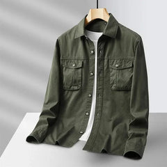 Green canvas overshirt with button front and two chest pockets