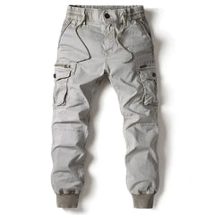Light grey cargo pants with drawstring waist, button fly, and side cargo pockets