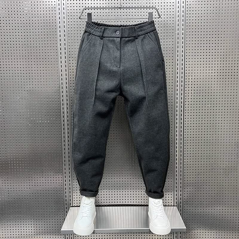 Men’s grey modern-fit trousers with pleated front and cuffed ankle hems