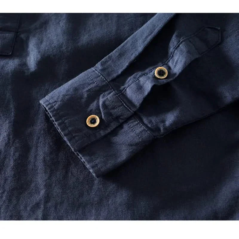 Navy linen mandarin shirt close-up of collar band and button placket
