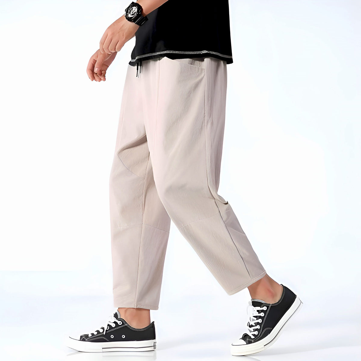 Khaki-beige cropped cotton pants with drawstring waist and relaxed tapered fit