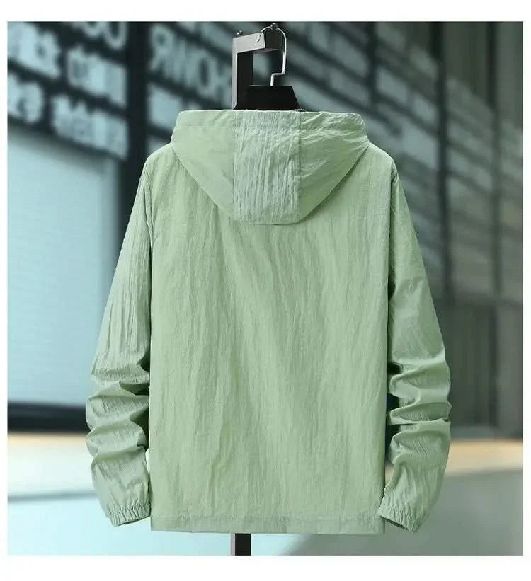 Light green hooded summer jacket, back view with drawstring hood and elastic cuffs