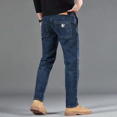 Blue utility jeans with front pocket, side stitching, and straight leg fit