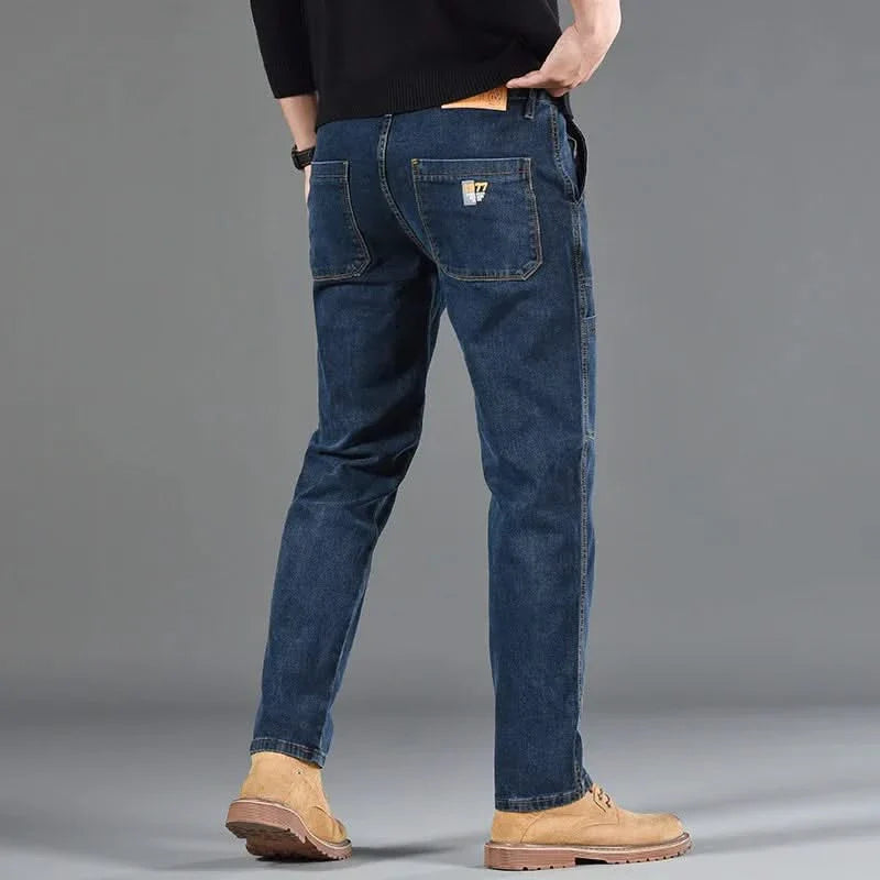 Blue utility jeans with front pocket, side stitching, and straight leg fit
