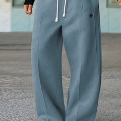 Blue wide-leg trousers with white drawstring and side pocket
