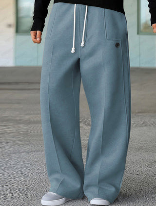 Blue wide-leg trousers with white drawstring and side pocket