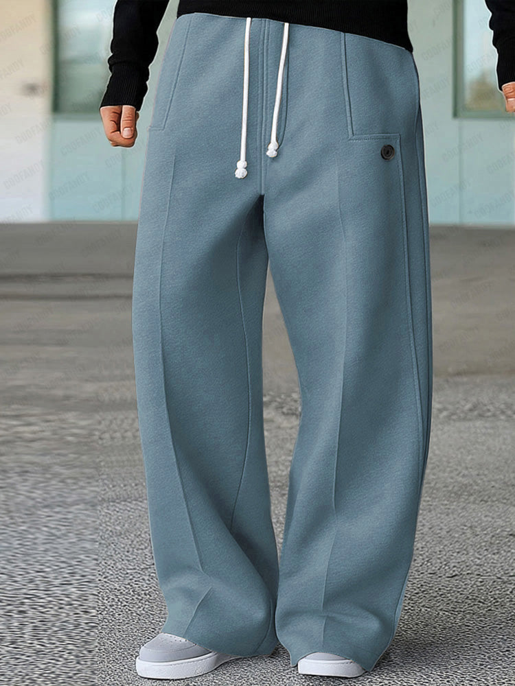 Blue wide-leg trousers with white drawstring and side pocket