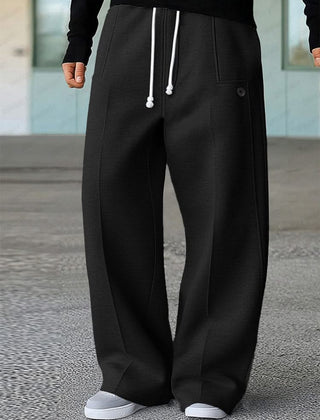 Black wide-leg trousers with white drawstring and side pockets