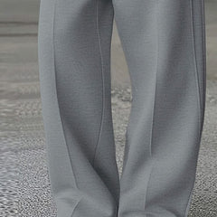 Grey wide-leg trousers with front pleat lines and wide straight leg opening