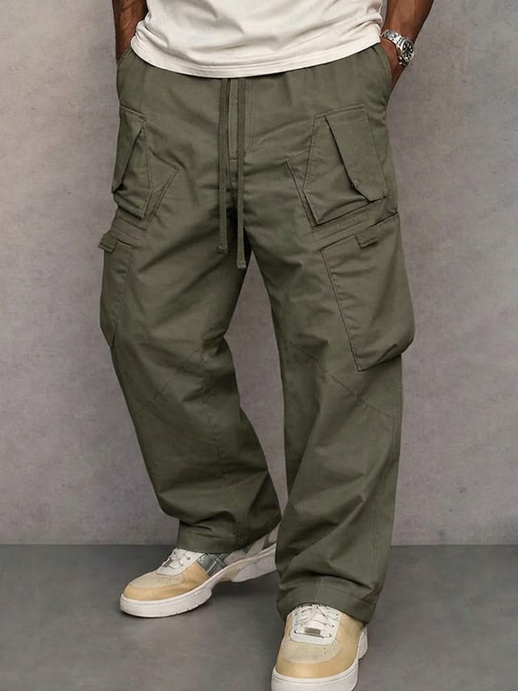 Olive green utility cargo trousers with drawstring waist and side flap pockets