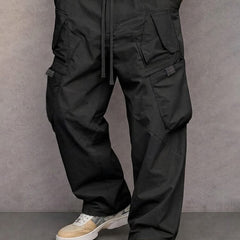Black utility cargo trousers with drawstring waist and side flap pockets