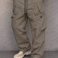 Taupe utility cargo trousers with drawstring waist and side flap pockets