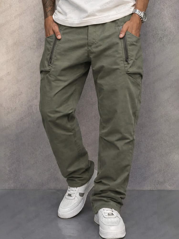 Army green cotton cargo pants with side zip pockets, tapered jogger cuffs