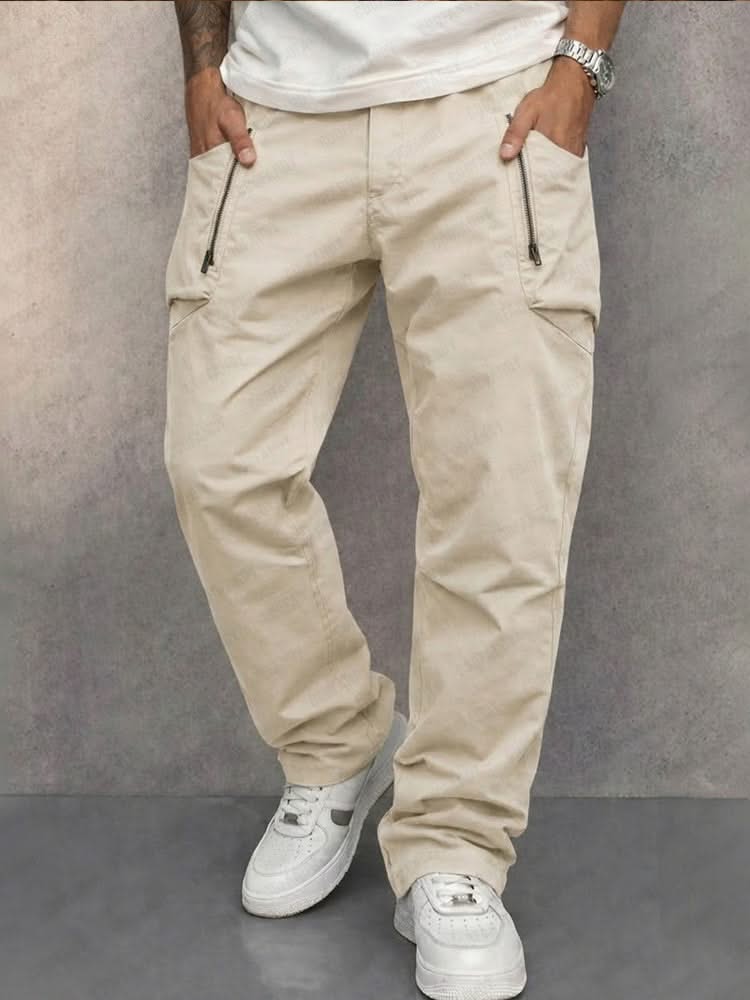 Apricot cotton cargo pants with side zip pockets, tapered jogger fit