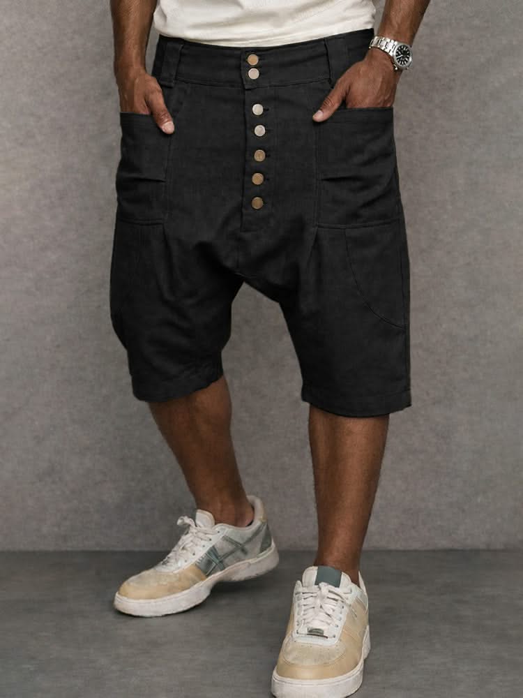 Casual drop-fit shorts in black, front button placket and side pockets.