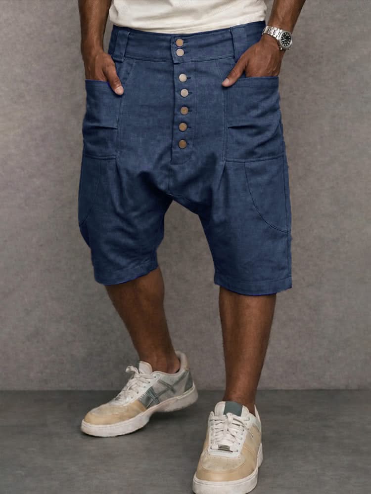 Casual drop-fit shorts in blue, front button placket and side pockets.