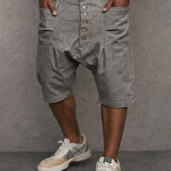 Casual drop-fit shorts in light grey, front button placket and side pockets.
