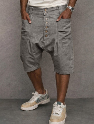 Casual drop-fit shorts in light grey, front button placket and side pockets.