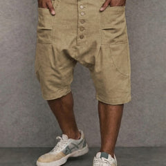 Casual drop-fit shorts in khaki, front button placket and side pockets.
