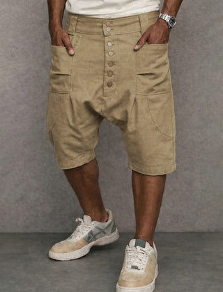 Casual drop-fit shorts in khaki, front button placket and side pockets.