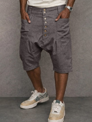 Casual drop-fit shorts in grey, front button placket and side pockets.