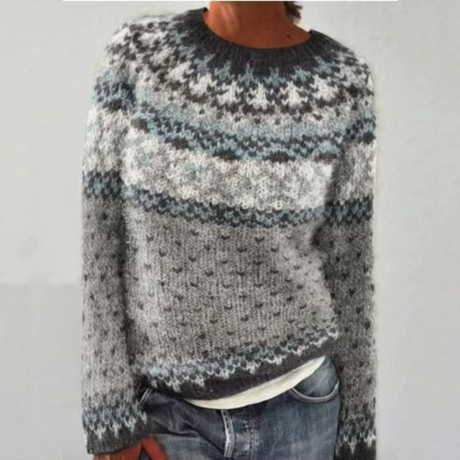 Wool knit crewneck sweater with fair isle pattern in gray, white, and blue.
