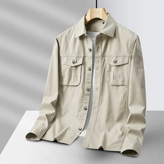 Beige canvas overshirt with button front and two chest pockets