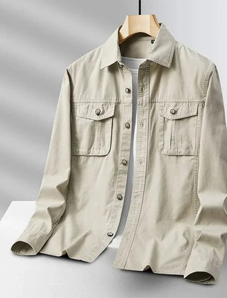 Beige canvas overshirt with button front and two chest pockets