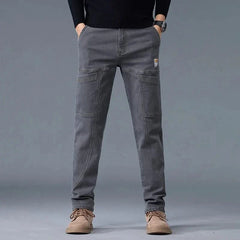 Grey utility jeans with cargo-style pockets and straight relaxed leg shape
